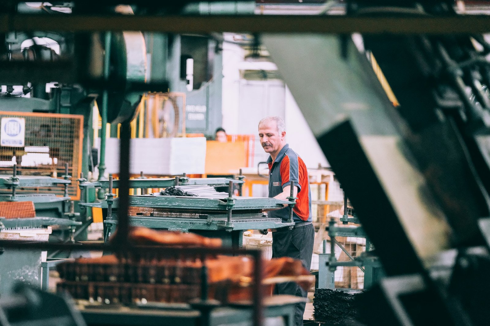 An operator running production machinery