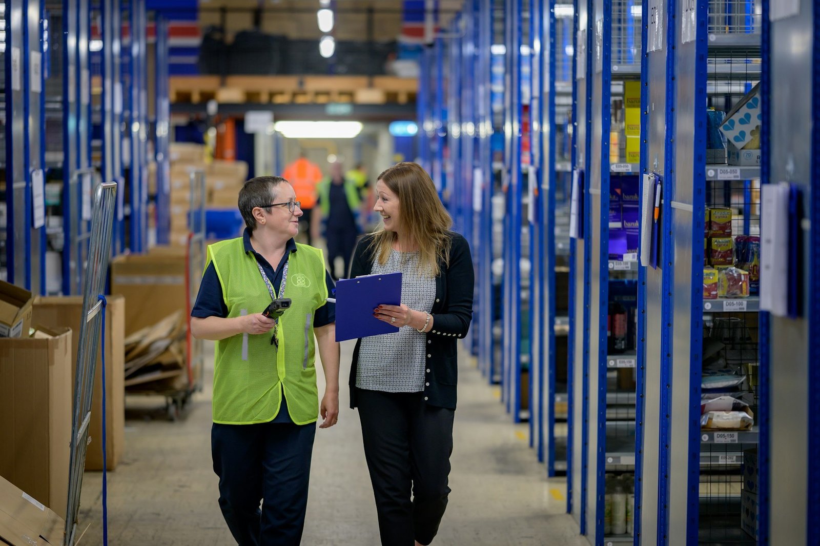 A warehouse team checking stock
