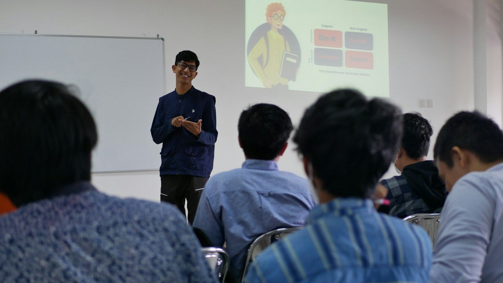 A trainer presenting new methods to participants